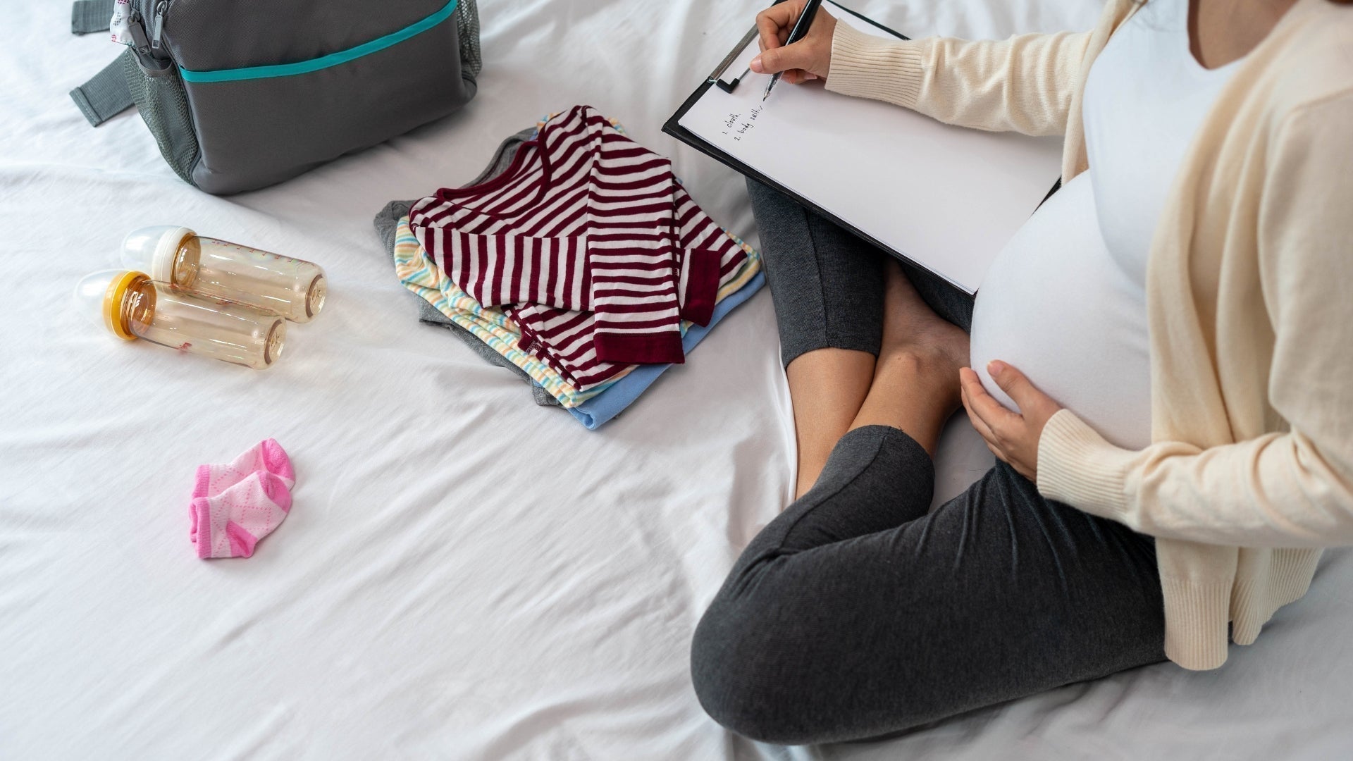Expectant Mom Creating to-do list