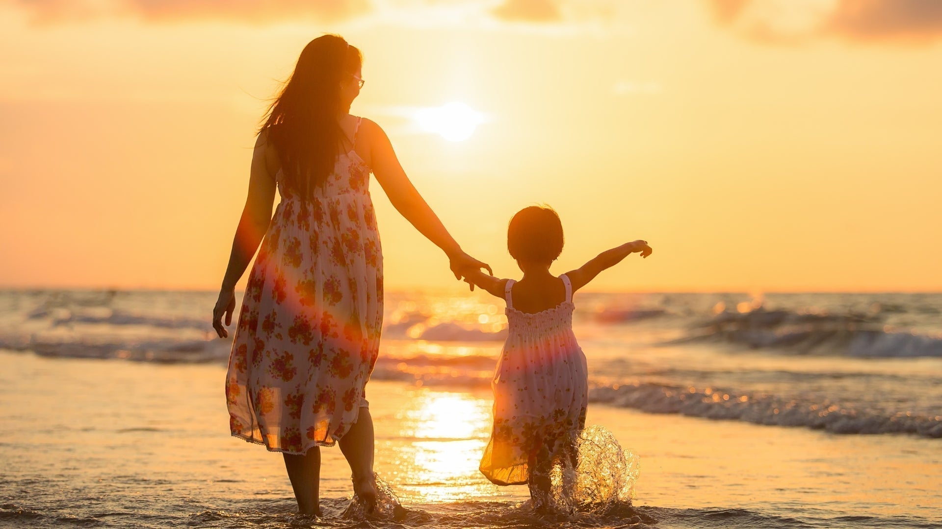 Mother and daughter at beach