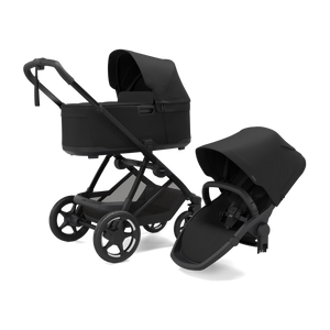 Black Thule Charm 2-in-1 Stroller with Bassinet and Toddler Seat - 3/4 View | Bambi Baby