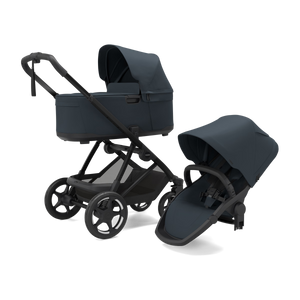 Darkest Blue Thule Charm 2-in-1 Stroller with Bassinet and Toddler Seat - 3/4 View | Bambi Baby