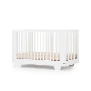 White dadada Spirit 8-In-1 Convertible Crib - Front View | Bambi Baby