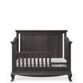 Oil Grey Wood Romina Antonio Toddler Rail installed on convertible crib - Front View | Bambi Baby