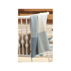 Blue Multi Color Block Knit Baby Blanket - Draped Over White Crib Rail in Nursery | Bambi Baby