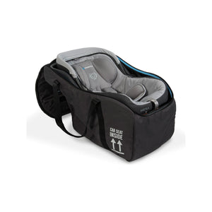 Black UPPAbaby TravelSafe Travel Bag - Open Angled View with Mesa Infant Car Seat Secured Inside | Bambi Baby