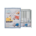 Grey Construction Zone Quilt and Crib Skirt Styled on Grey Baby Crib - Angled View | Bambi Baby