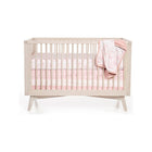 Blush Pink Cotton Band Crib Skirt on Mid-Century Wood Crib - Coordinated Nursery Set View | Bambi Baby