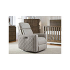 Cloudy Gray Leather Soho Power Glider - Angled View in Styled Nursery with Crib | Bambi Baby
