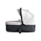 White mima Creo Bassinet with Canopy Extended - Angled Front View | Bambi Baby