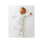 White Bamboo Blend Arms Out Sleep Sack - Sleeping Newborn On Model Top View | Bambi Baby