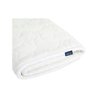White Halo DreamWeave Breathable Crib Cover - Folded with Zipper and Label Detail | Bambi Baby
