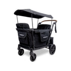 Black WonderFold L4 Quad Stroller Wagon with extended canopy & leather handlebar - Side Angle View | Bambi Baby