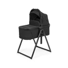 True Black Fabric PEG Ypsi Bassinet with Stand - Angled Three-Quarter View | Bambi Baby