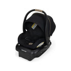 Sea Shadow Black Maxi-Cosi Mico Pro Infant Car Seat with Tan Handle on Base - Side Angle View | Bambi Baby