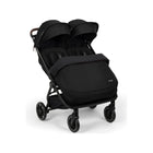 Caviar Black Nuna TRVL Dubl Double Stroller with Footmuff Installed - 3/4 Angle View | Bambi Baby