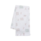 White Fleece Baby Blanket Taupe Sage Dot Cross Print - Angled Folded View | Bambi Baby