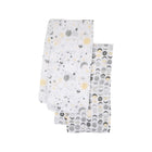 White Cotton Muslin Swaddle Blankets 2-Pack, Celestial Star & Moon Phase Print - Angled Flat Lay | Bambi Baby