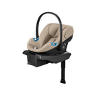 Almond Beige CYBEX Aton G2 Infant Car Seat with Load Leg Base - Angle View | Bambi Baby