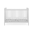 Bianca White Delta Children Saint 4-in-1 Convertible Crib - Angled Front View, Spool Spindle Detail | Bambi Baby