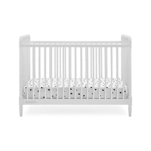 Bianca White Delta Children Saint 4-in-1 Convertible Crib - Angled Front View, Spool Spindle Detail | Bambi Baby