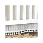 Off-White Cotton Boho Crib Skirt Tassel and Schiffli Border Close-Up | Bambi Baby