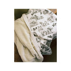 Cream Organic Cotton Infant Blanket - Both Sides Shown, Plush & Woodland Print Folded | Bambi Baby