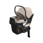 Sand Beige UPPAbaby Aria V2 Infant Car Seat - 3/4 Side View with ISOFIX Base | Bambi Baby