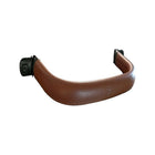 Tan Perforated Faux Leather Stroller Bumper Bar - Angled View with Clips | Bambi Baby