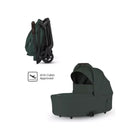 Conifer Green Silver Cross Nia Compact Travel Bassinet - Side View with Folded Chassis, IATA Cabin Approved | Bambi Baby