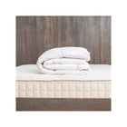 White Organic Cotton Kids Down Duvet Insert - Folded on Naturepedic Mattress | Bambi Baby