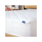 White Quilted Organic Kids Mattress Protector Pad - Lifestyle On Bed | Bambi Baby