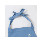 Sky Blue Organic Linen Toddler Apron - Neck Tie Bow & Piccalio Logo Close-Up | Bambi Baby