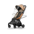 Clear Transparent Mima Miro Rain Cover on Tan Stroller - Rear Three-Quarter View | Bambi Baby