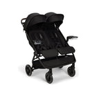 Black Nuna TRVL dubl Double Stroller with Dual Snack Trays Attached - Three-Quarter View | Bambi Baby
