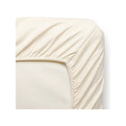 Ivory Organic Cotton Sateen Crib Sheet - Elastic Corner Close-Up | Bambi Baby
