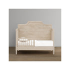 Whitewashed Ash Bellini Lucca Toddler Bed with Wood Guardrail Installed - Studio View | Bambi Baby