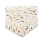 White Cotton Fitted Crib Sheet - Side Corner View, Garden Print Detail | Bambi Baby