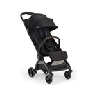 Caviar Black Nuna VIAA cabn Lightweight Travel Stroller - Front Three-Quarter View | Bambi Baby