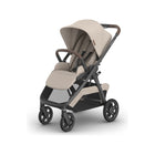 UPPAbaby Kona Stroller in Ada (cream/sand) with walnut bumper bar - 3/4 Right View | Bambi Baby
