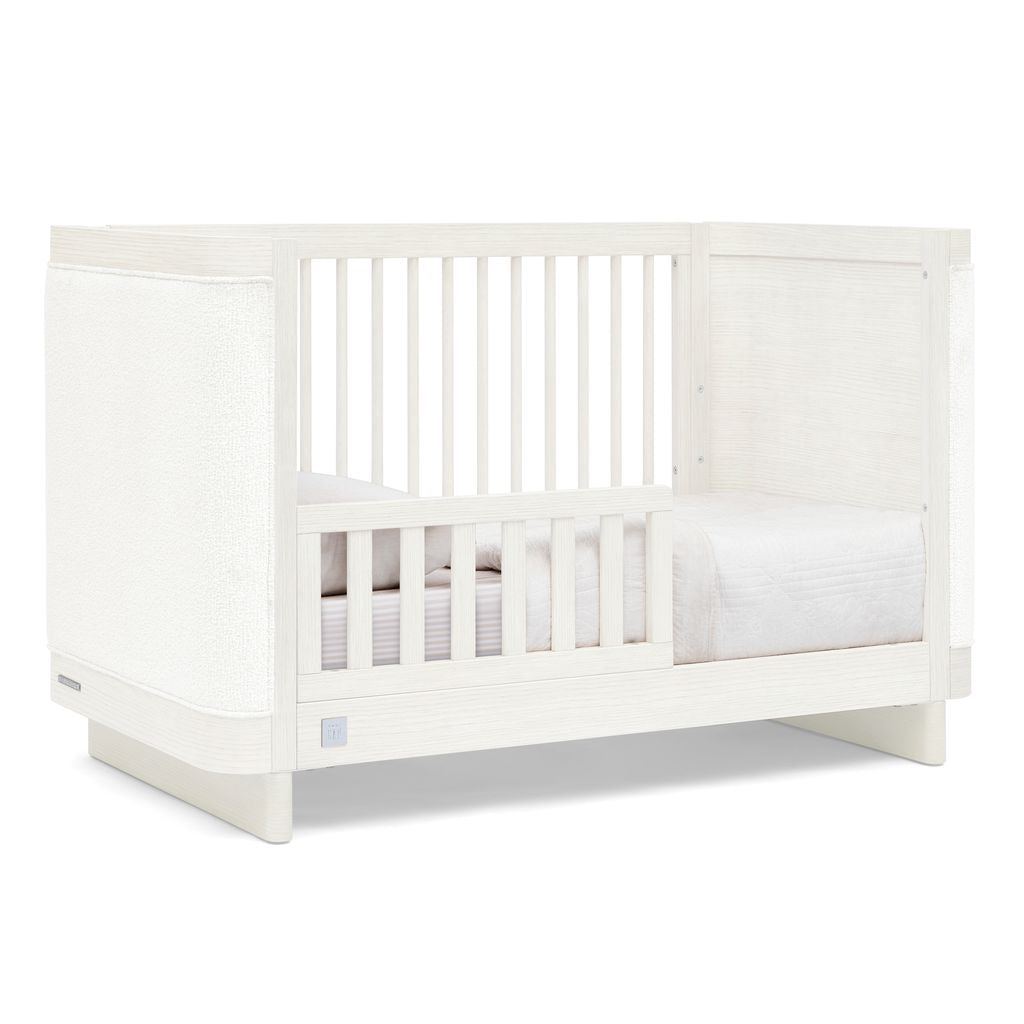 babyGap by Delta Children Callie 4-in-1 Upholstered Convertible Crib- Bambi Baby