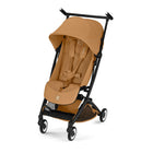 Cinnamon Yellow CYBEX Libelle Lightweight Travel Stroller with Black Frame - Front Angle View | Bambi Baby