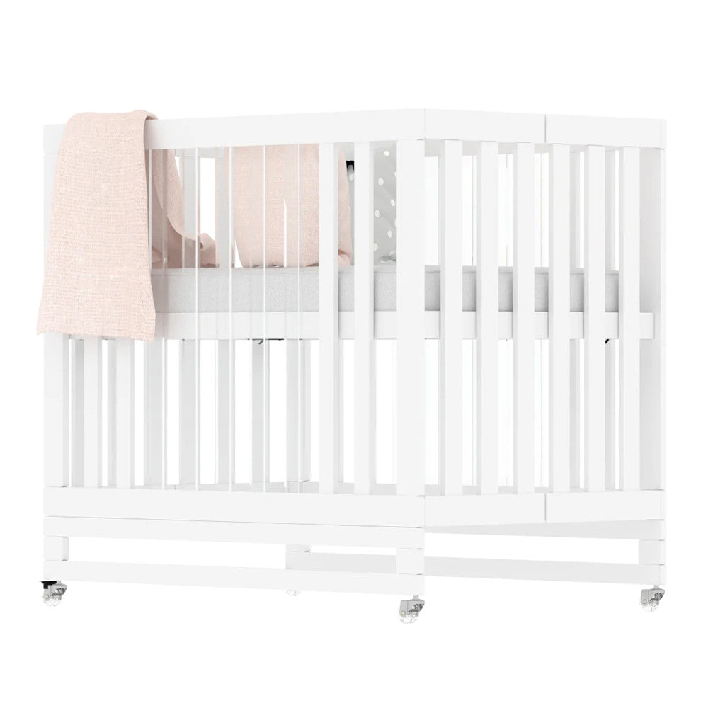 Melo Caress Crib in White/Part Acrylic - Standard Mini Crib Size- Bambi Baby