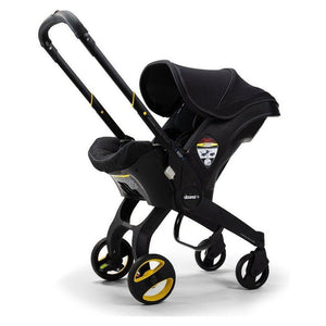 Midnight Black Doona Infant Car Seat Stroller - Side View | Bambi Baby