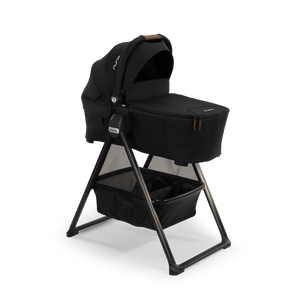 Caviar Black Nuna SWIV TRIV Series Bassinet Stand - Angled Product View with Under-Storage | Bambi Baby