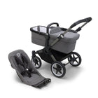 Graphite Grey Melange Bugaboo Donkey 5 Base with Bassinet & Seat Liner - Three Quarter View | Bambi Baby