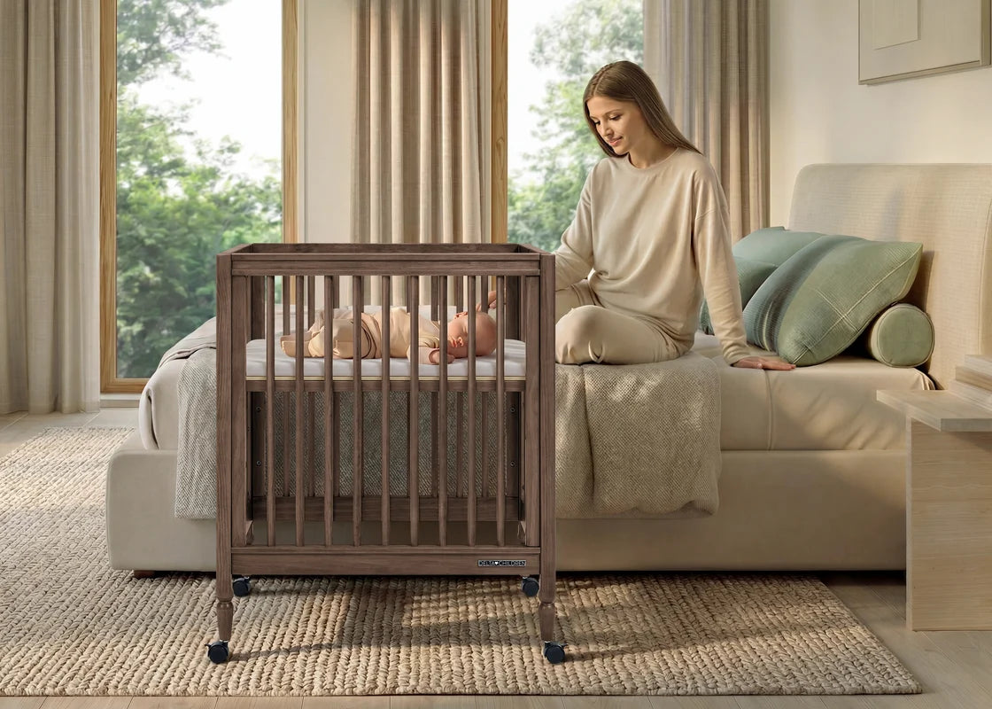 Delta Children Jalen Grow With Me 9-in-1 Convertible Bassinet to Crib- Bambi Baby