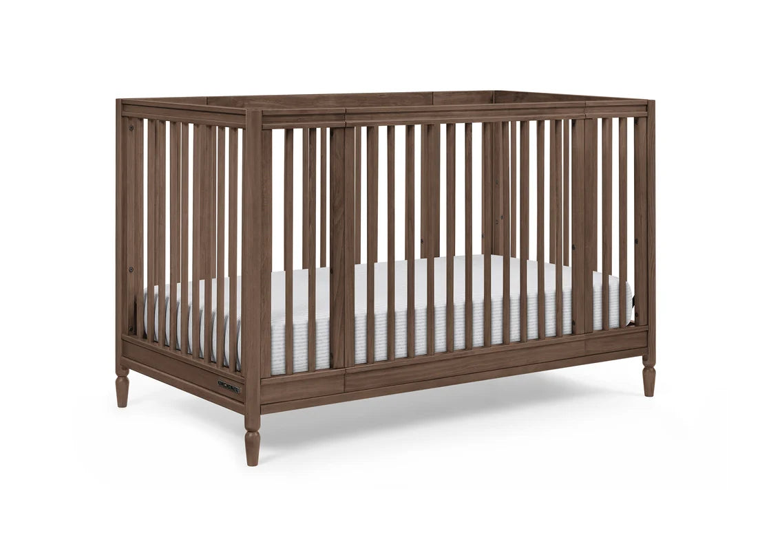 Delta Children Jalen Grow With Me 9-in-1 Convertible Bassinet to Crib- Bambi Baby