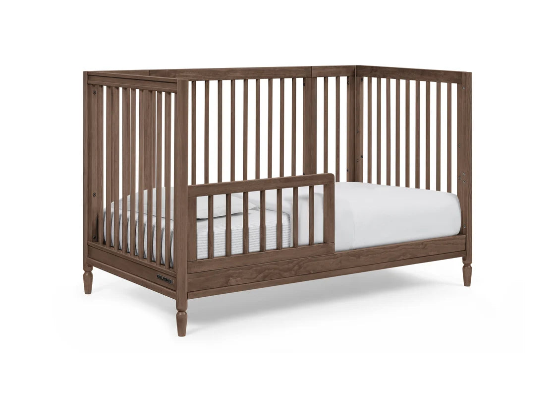 Delta Children Jalen Grow With Me 9-in-1 Convertible Bassinet to Crib- Bambi Baby