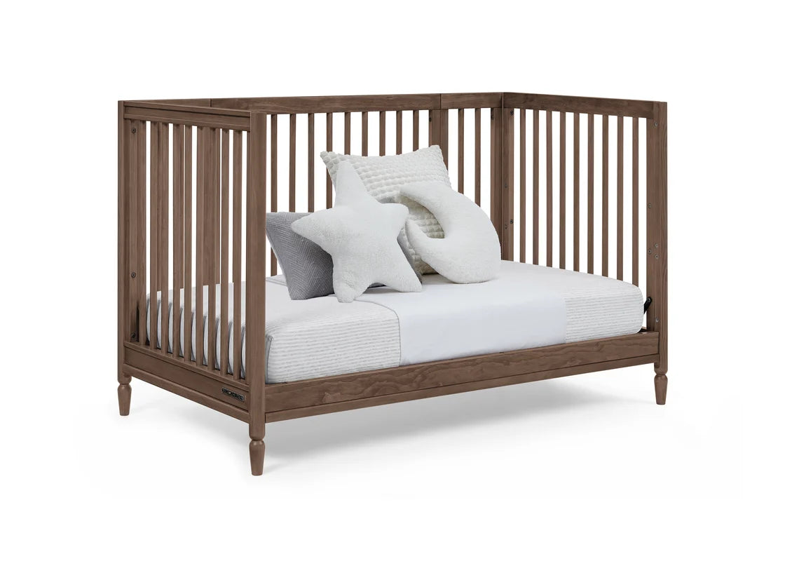 Delta Children Jalen Grow With Me 9-in-1 Convertible Bassinet to Crib- Bambi Baby