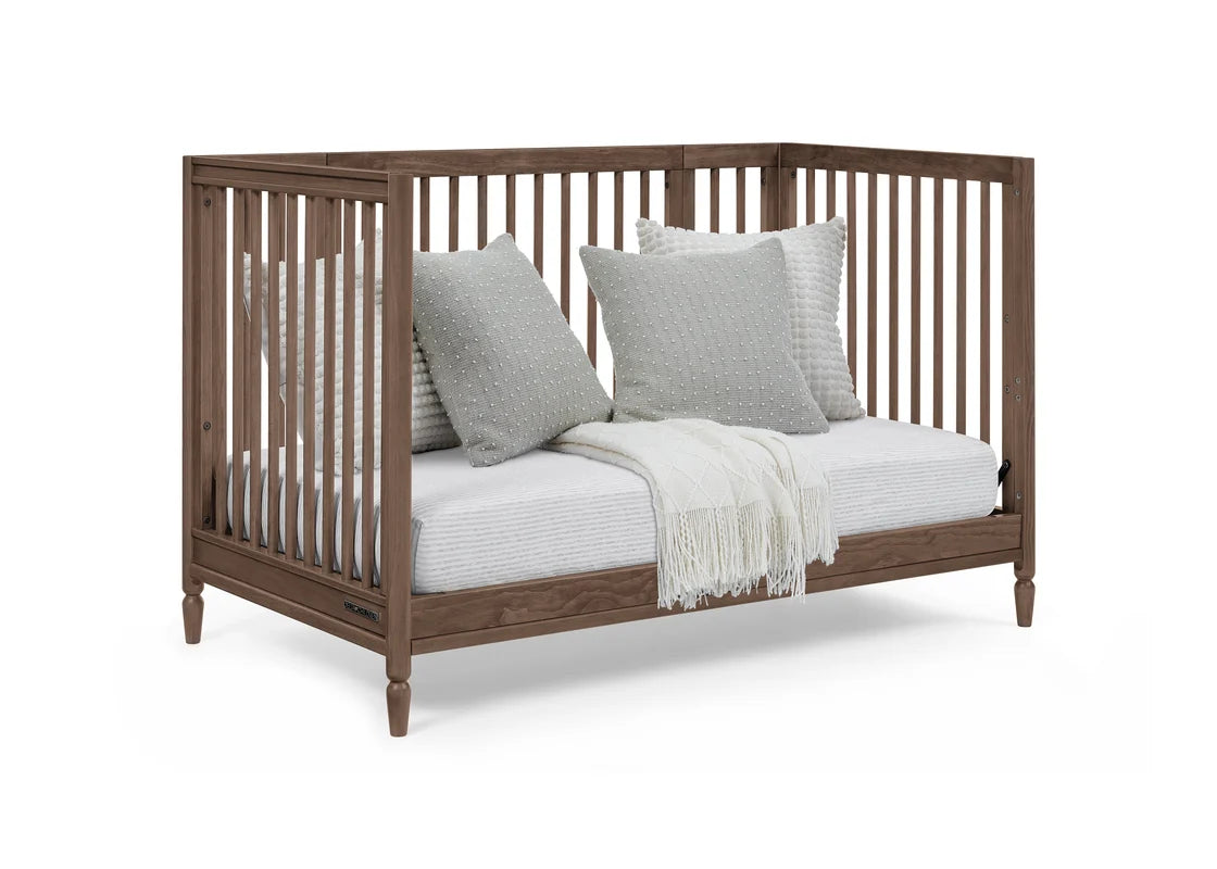 Delta Children Jalen Grow With Me 9-in-1 Convertible Bassinet to Crib- Bambi Baby