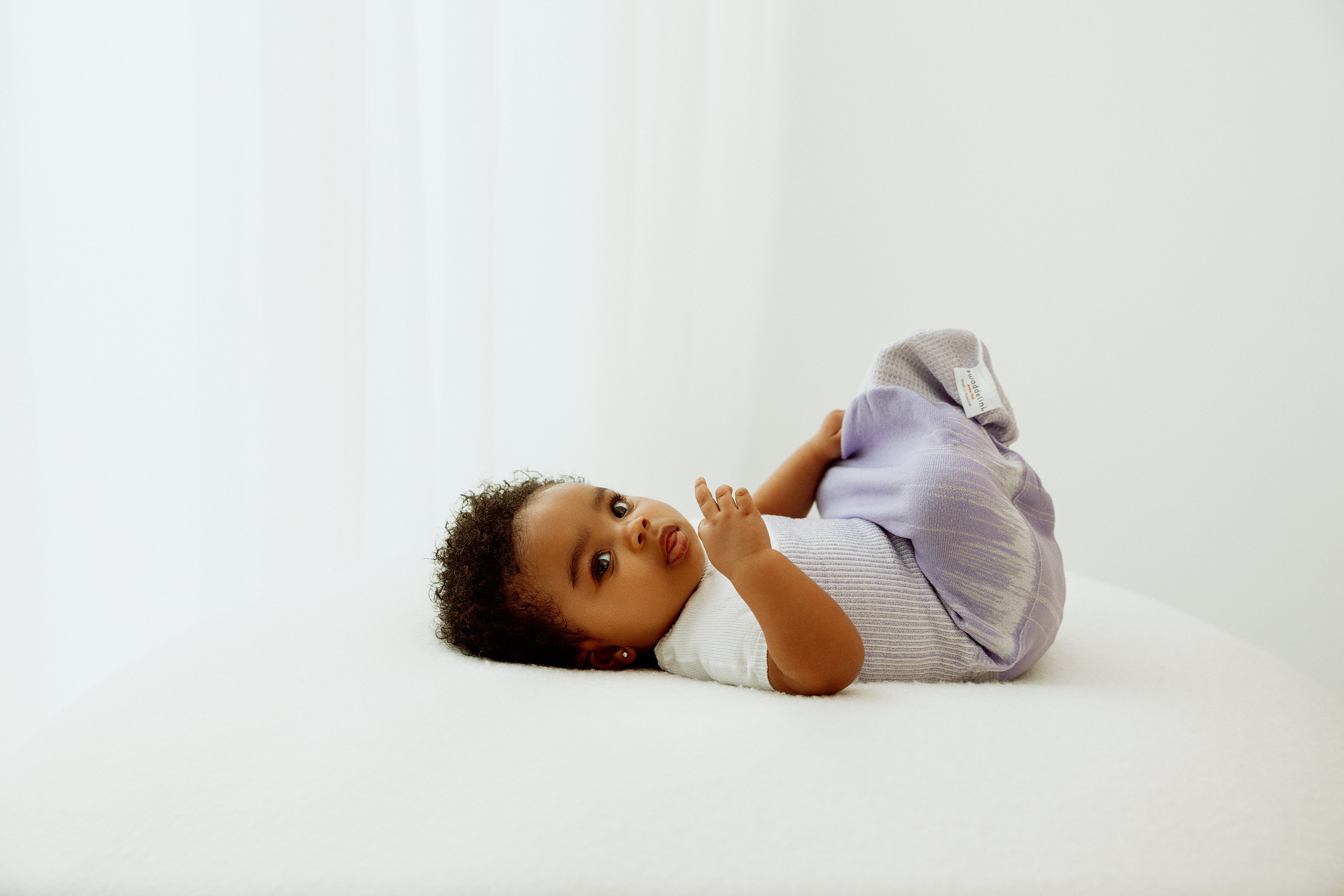 Swaddelini Lavender Arms Out™ Short Sleeve Sleep Sack- Bambi Baby